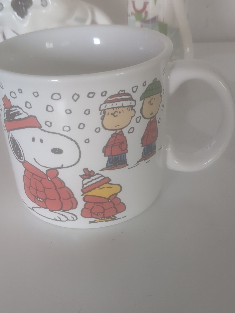 Peanuts White Ceramic Mug with Red Winter Characters